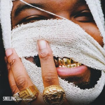 GENESIS OWUSU - SMILING WITH NO TEETH